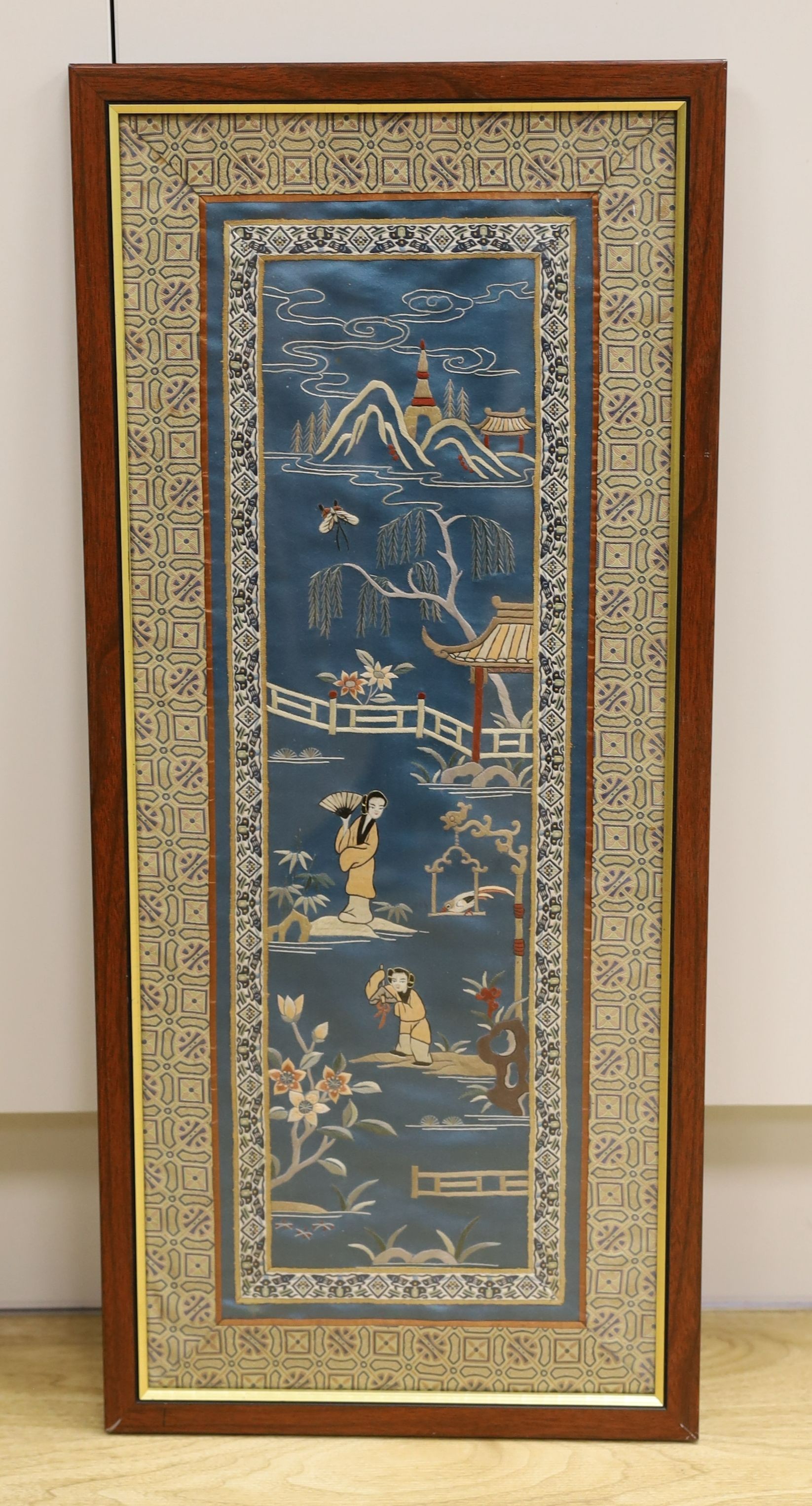 Two Chinese carved gilt wooden panels, a cased set of chopsticks, a boxed silk woven scroll and lacquer mahjong stands, a hand scroll and silk embroidery